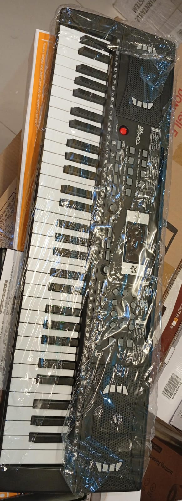 Teclado de piano eléctrico, 61 teclas, funcion grabación y reproducción.