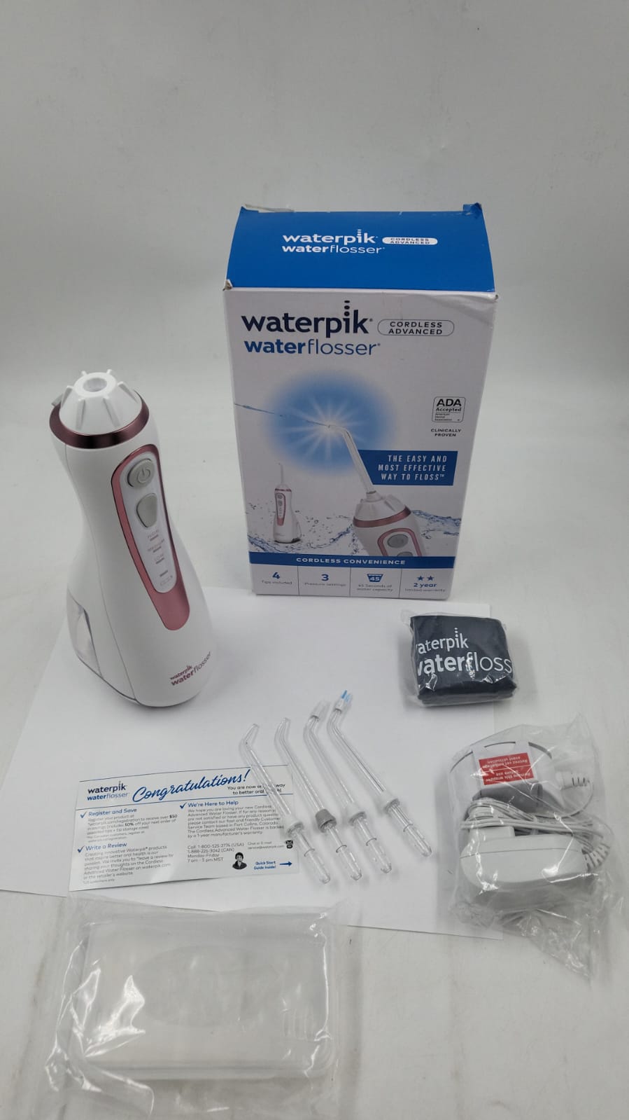 Waterpik Irrigador bucal portátil recargable con hilo dental inalámbrico