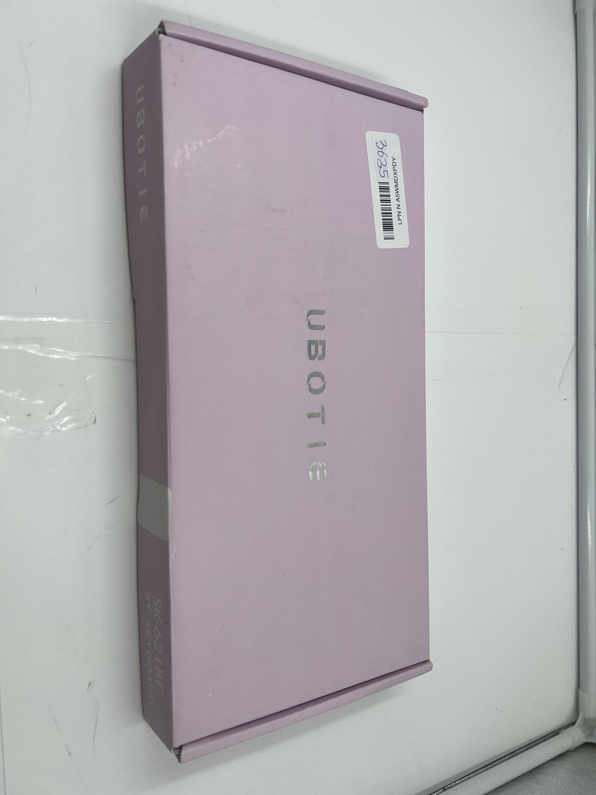 Teclado portátil Ubotie Bluetooth colorido inalámbrico