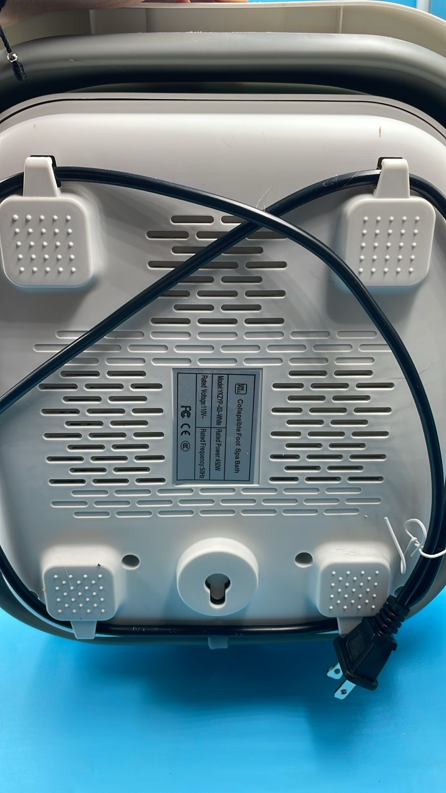 Bañera plegable para pies con rodillos de calor y masaje.