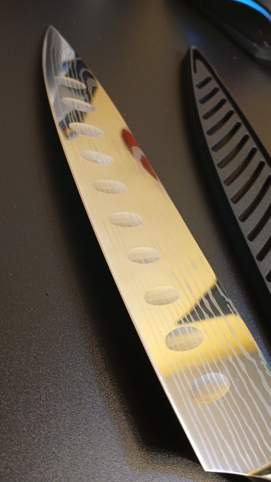 Cuchillo de cocina de acero inoxidable, patron Damasco.