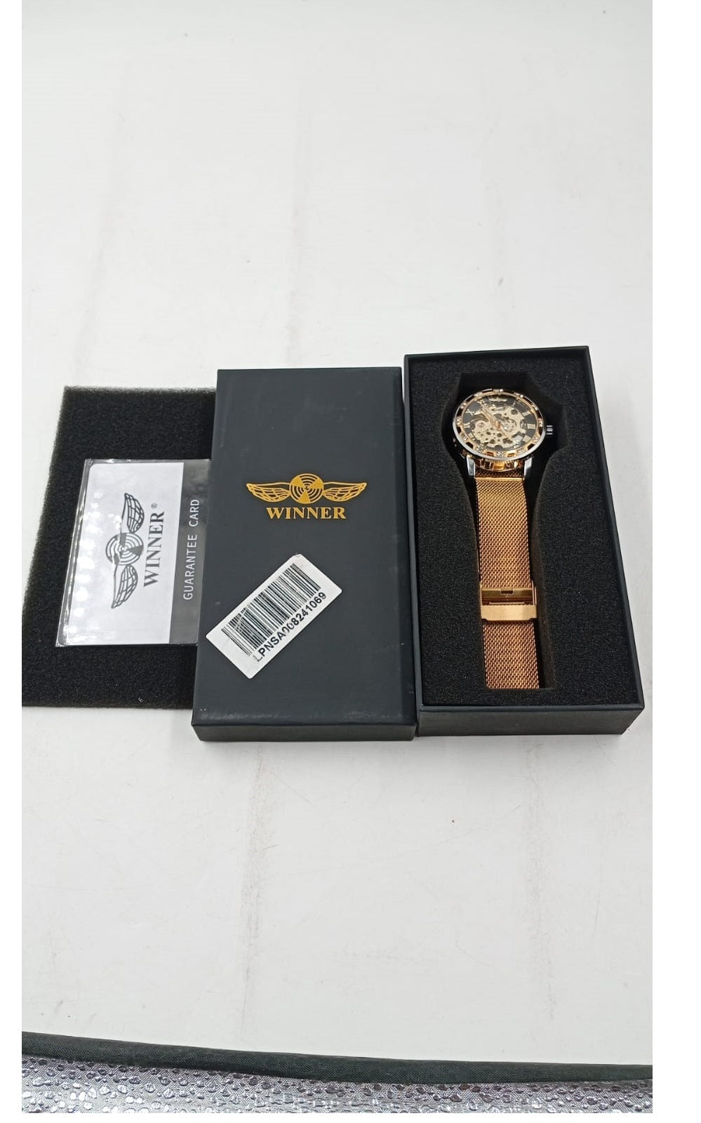 Reloj mecánico, diseño de esqueleto y talla de flores, Winner.