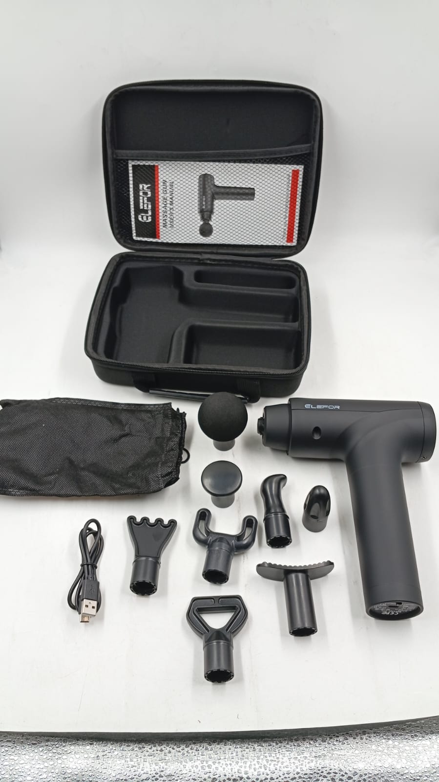 PISTOLA MASAJEADORA ELEFOR, 8 CABEZALES.(USADA CON DETALLE)