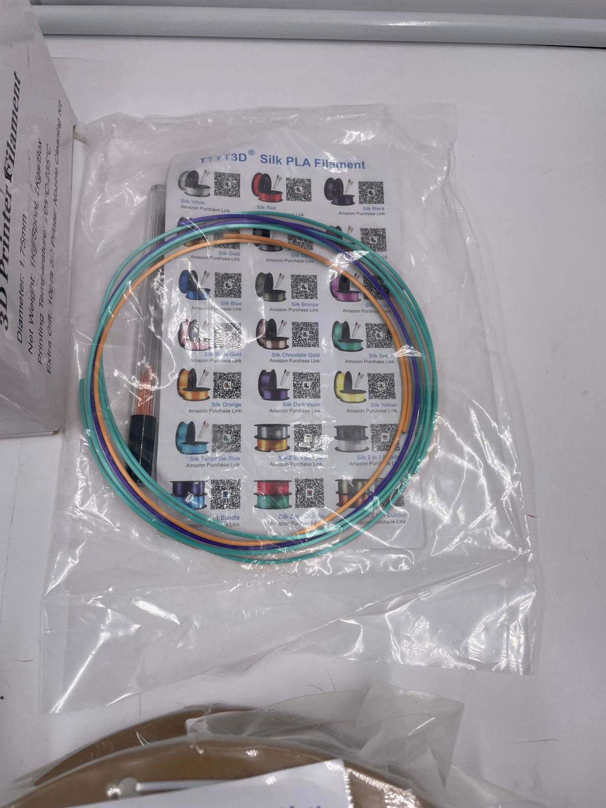 Paquete de filamento PLA 2 en 1 para impresora 3D, blanco brillante y negro.