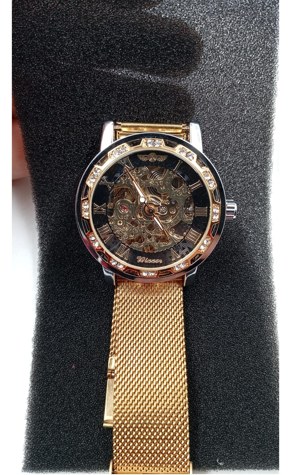 Reloj mecánico, diseño de esqueleto y talla de flores, Winner.