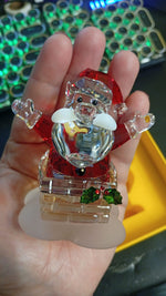 Figura de Swarovski, Santa Claus y Chimenea 5701507, Original.