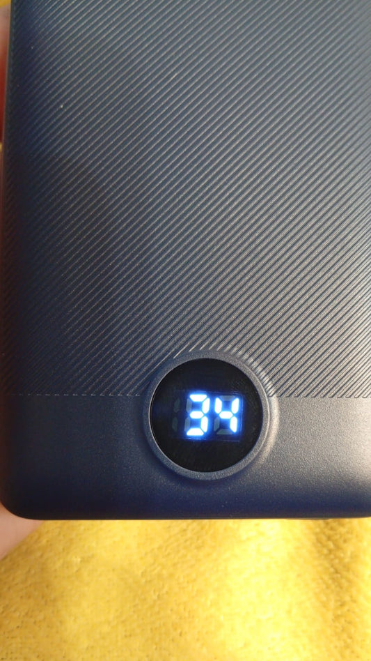 Cargador portátil con cables y enchufe de pared, 10000 mAh (USADO).