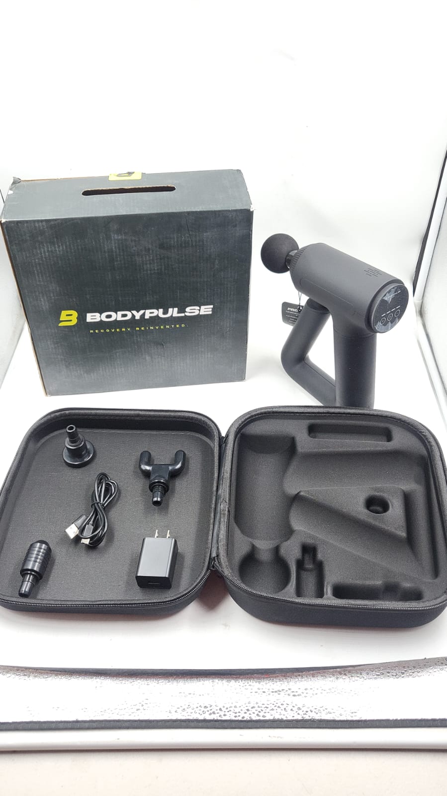 Pistola electrica de masaje muscular profundo. BodyPulse