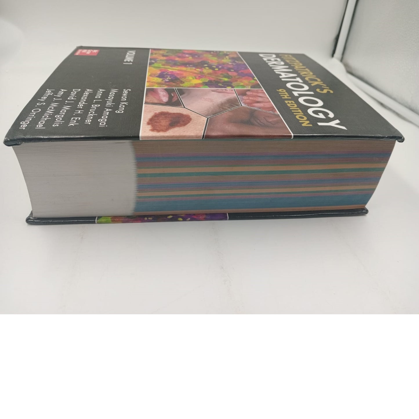 Libro Fitzpatrick's Dermatology, 9th Edicion, Volumen 1, editorial McGraw.