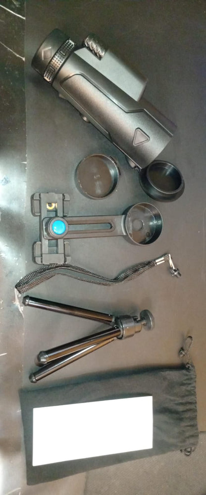 Telescopio monocular 12x50, con soporte para smartphone y trípode.
