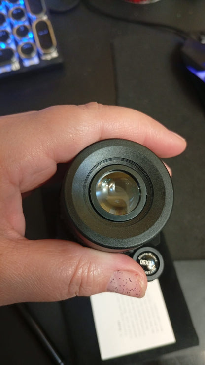 Telescopio monocular 12x50, con soporte para smartphone y trípode.