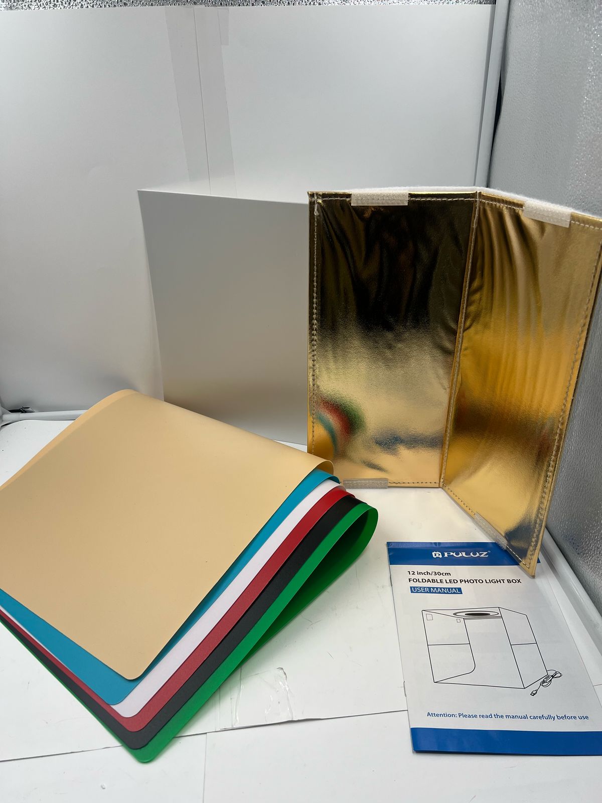 PULUZ - Caja de estudio fotográfico portátil con luz