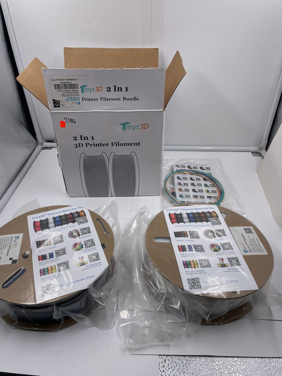 Paquete de filamento PLA 2 en 1 para impresora 3D, blanco brillante y negro.