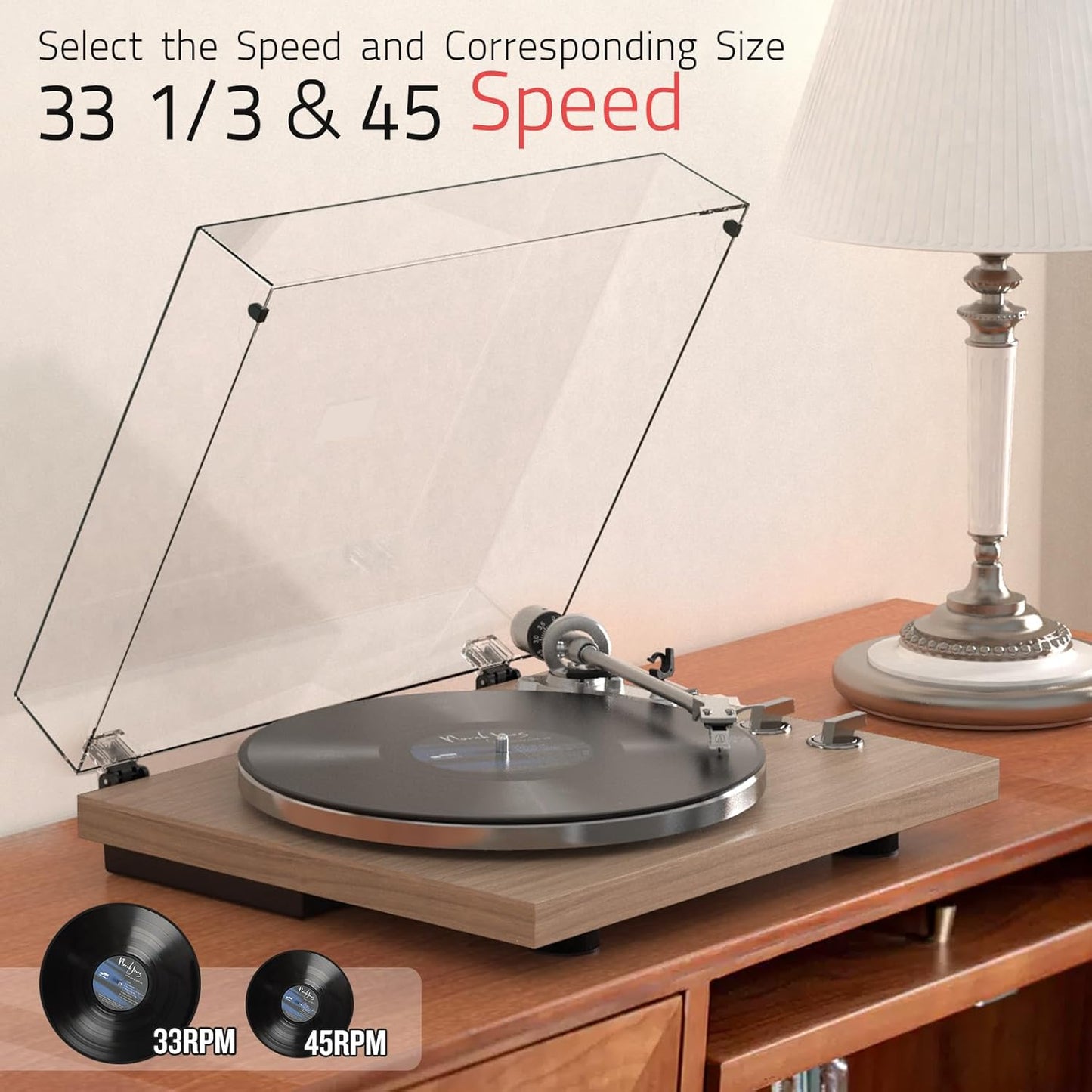 Reproductor de discos, transmisión por correa, 33-45 rpm.