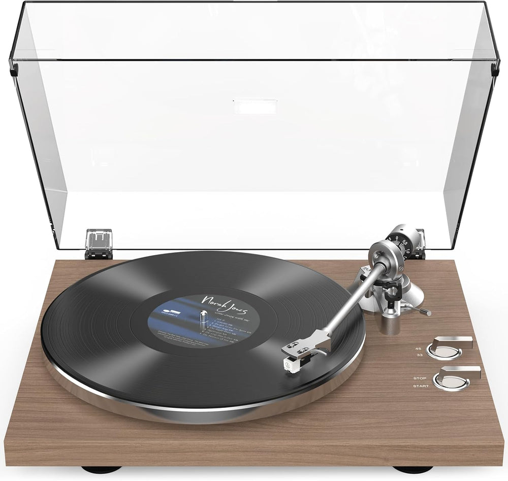 Reproductor de discos, transmisión por correa, 33-45 rpm.