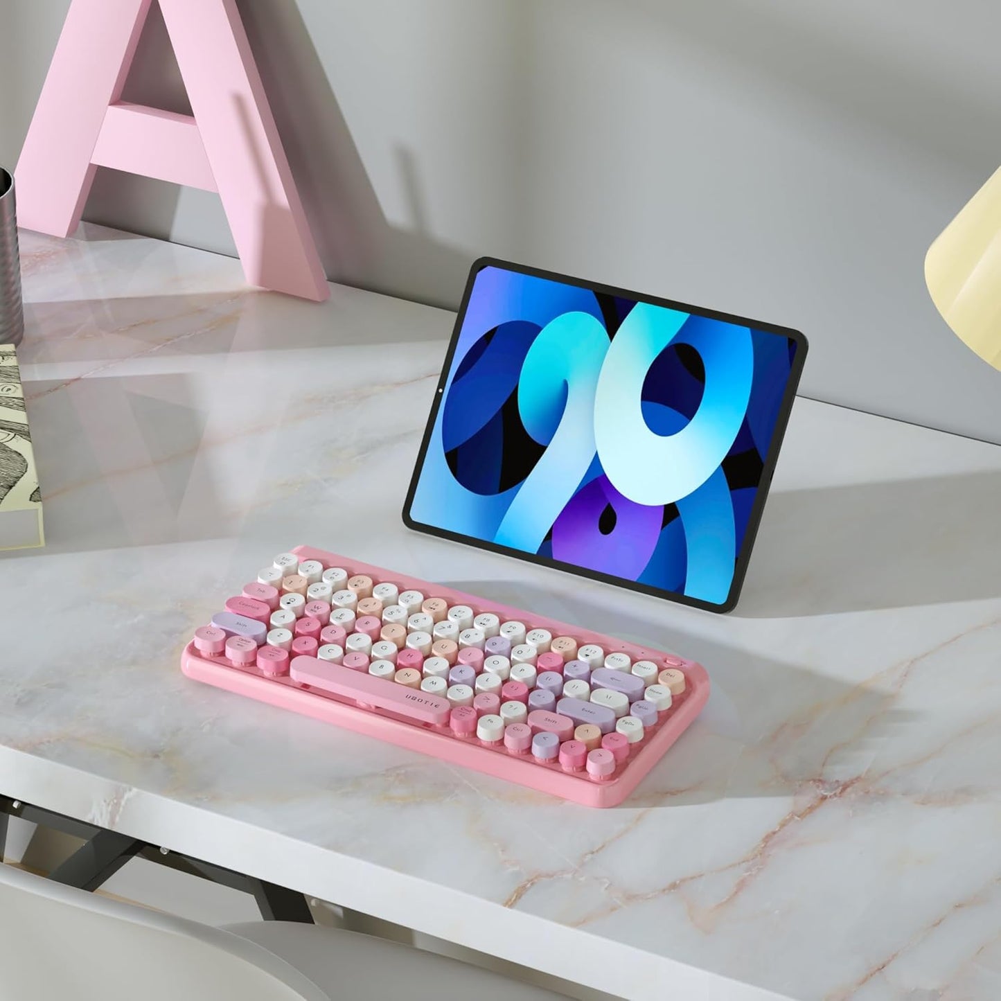 Teclado portátil Ubotie Bluetooth colorido inalámbrico