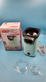Máquina de palomitas de maíz con taza de medición DASH CAJA ABIERTA