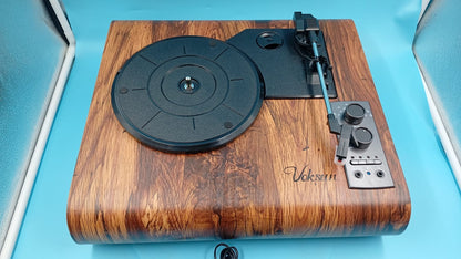 Reproductor de vinilos Voksun con Bluetooth, AM/FM, 3 velocidades.