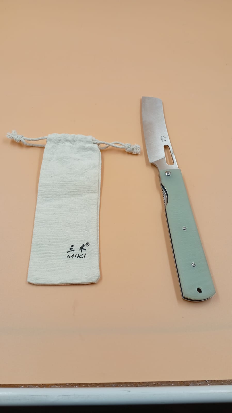 Miki Cuchillo de chef, plegable, ultra afilado, mango natural