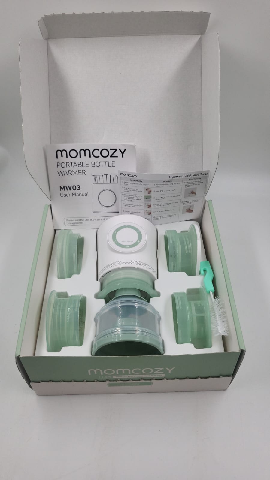 Calentador de biberones portátil para viajes. USADO Momcozy