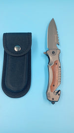 Cuchillo plegable de bolsillo, cortador de cinturón, rompe vidrios. (USADO)