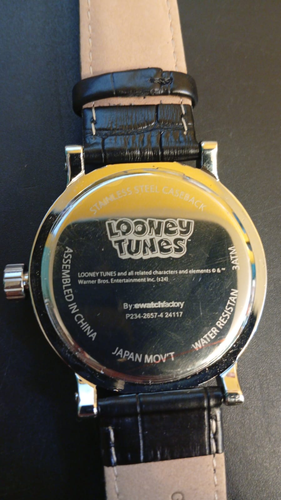 Reloj para adultos, correa de cuero, Looney Tunes, Pato Lucas.