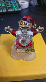 Figura de Swarovski, Santa Claus y Chimenea 5701507, Original.