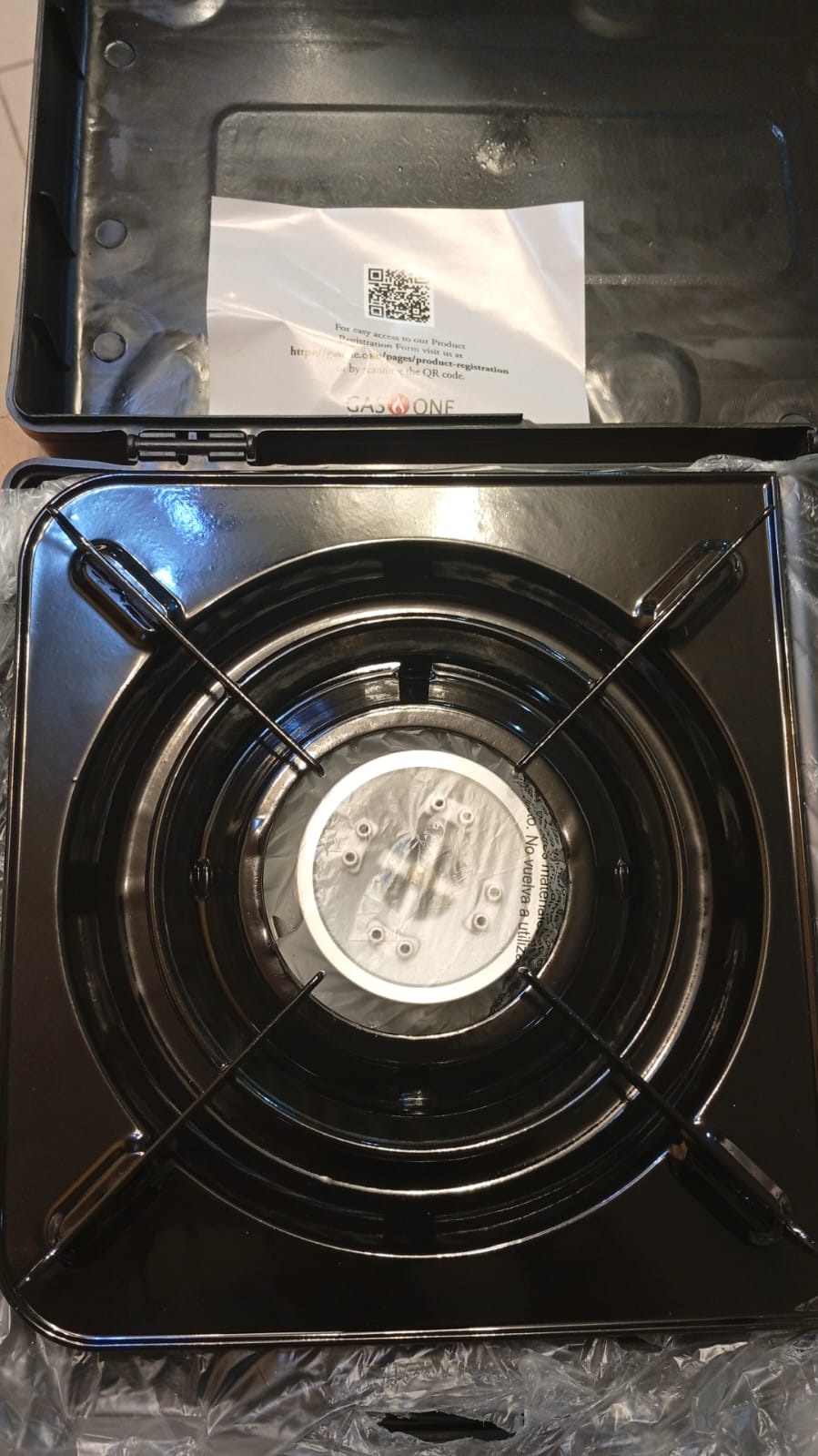 Estufa de gas butano portátil de 10.000 BTU con estuche (DETALLE).