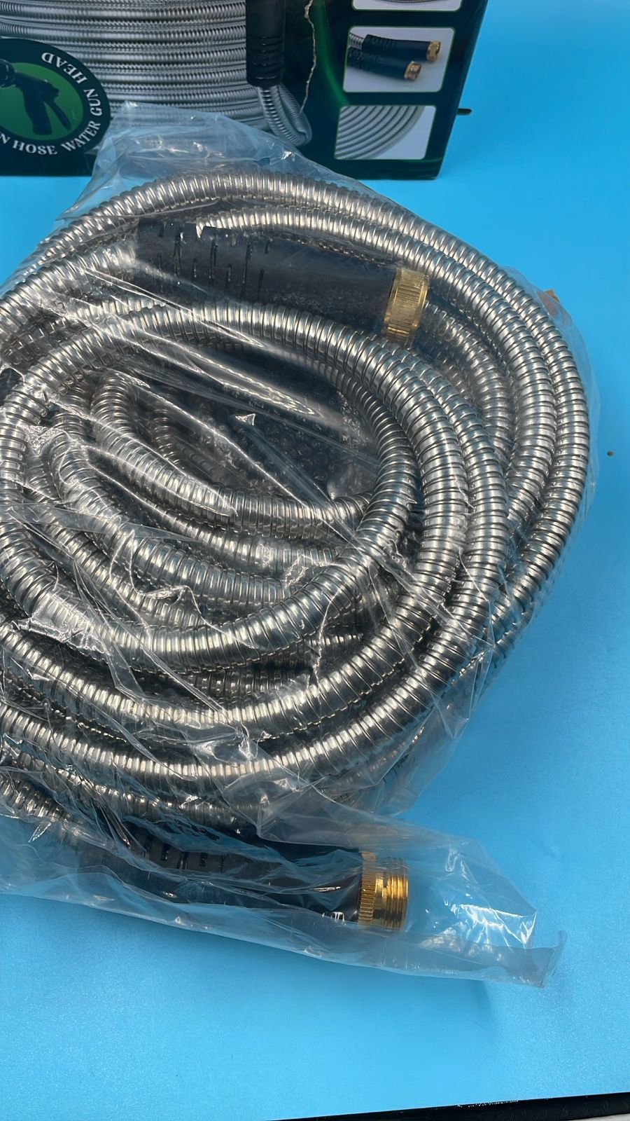 Manguera de jardín de acero inoxidable de 50 pies con boquillas de 10 funciones.