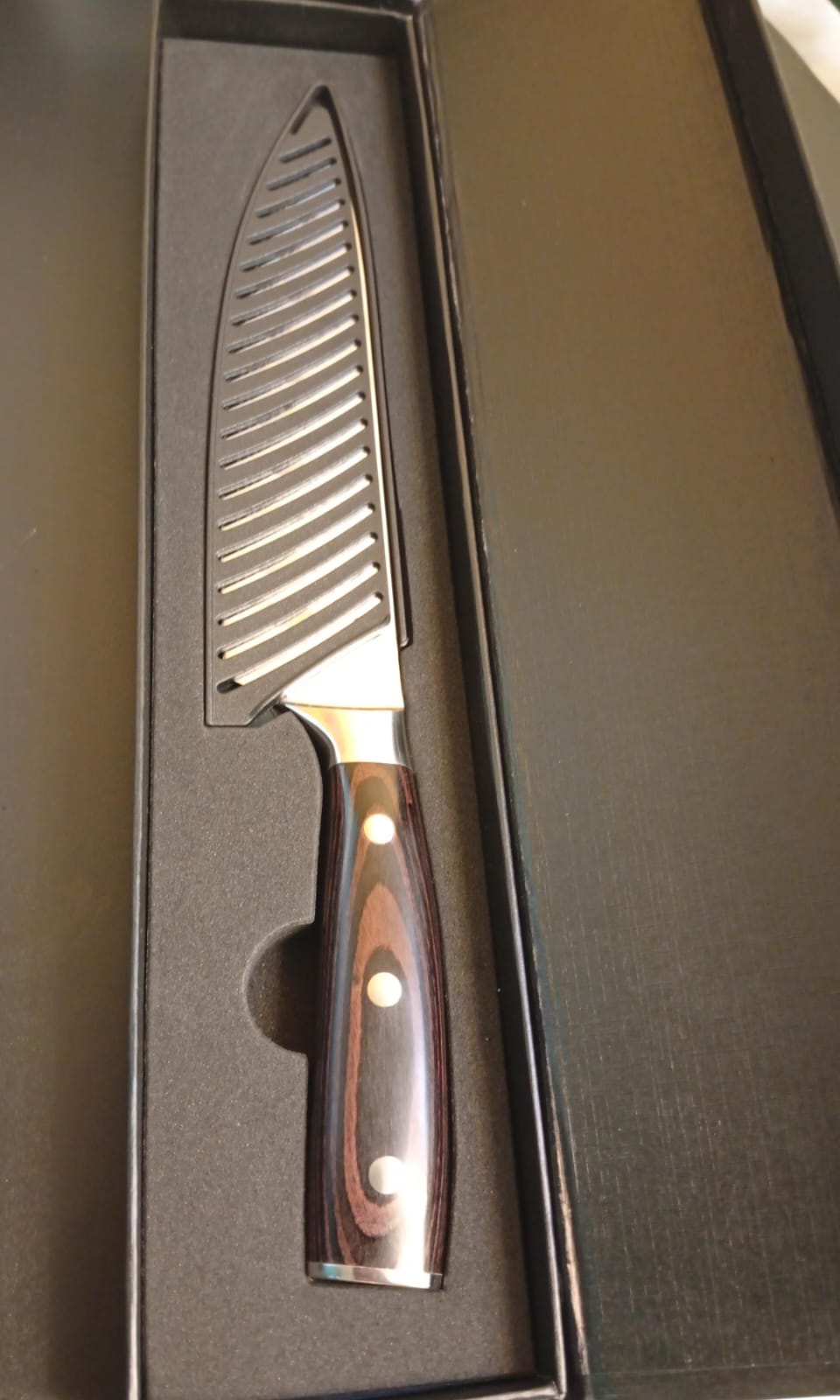 Cuchillo de cocina de acero inoxidable, patron Damasco.