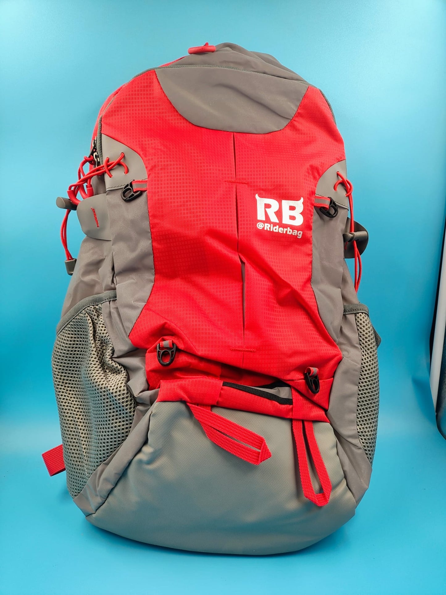 Mochila reflectante RIDERBAG.Alta visibilidad, viajeros, motocicleta, color roja.