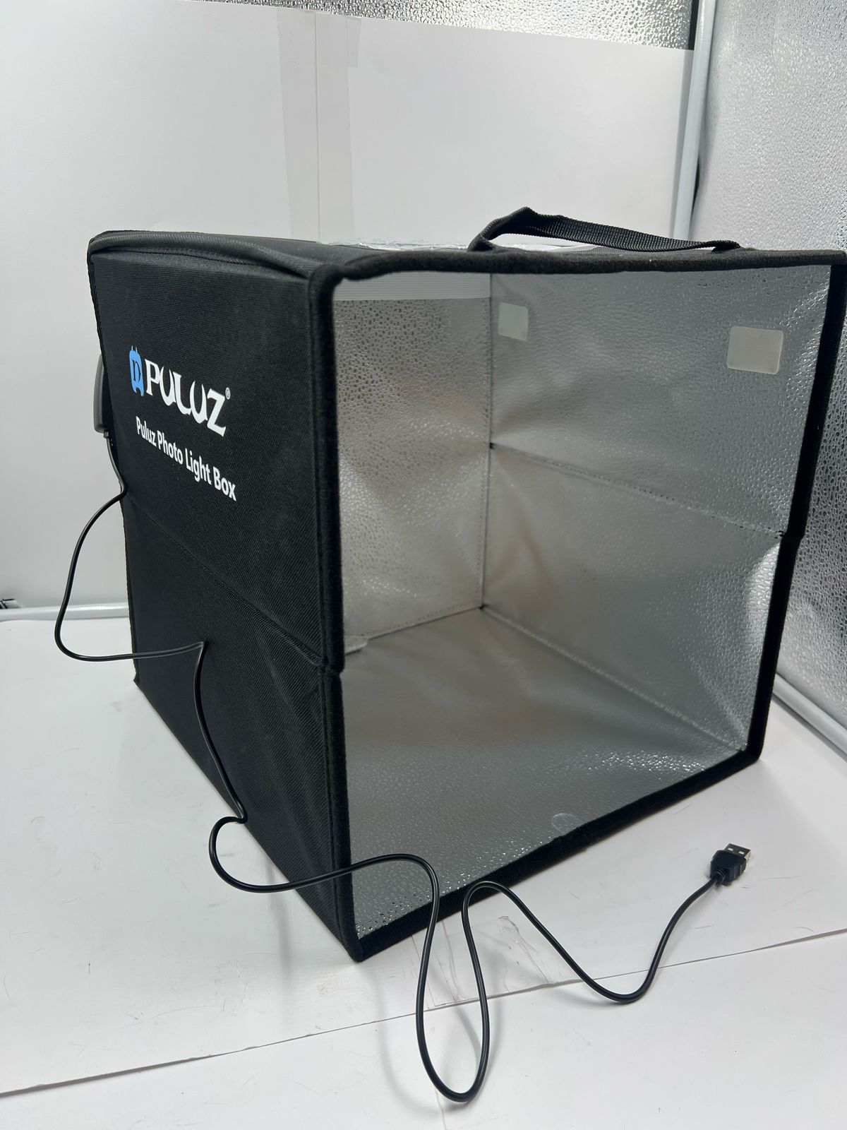 PULUZ - Caja de estudio fotográfico portátil con luz