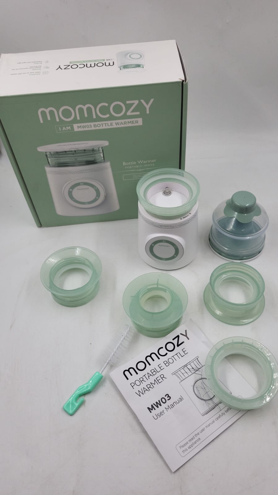 Calentador de biberones portátil para viajes. USADO Momcozy