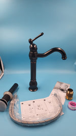 Grifo giratorio de 360° para lavabo de una sola manija y drenaje, bronce aceitado